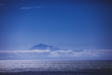 Silhouette of the volcano Teide seen from La Palma island on a sunny day.
