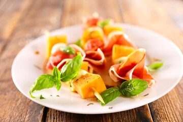 Prosciutto and ham with fresh basil