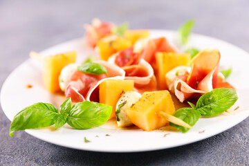 Prosciutto and ham with fresh basil