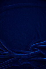 Dark blue velvet fabric texture used as background. Sky color panne fabric background of soft and...