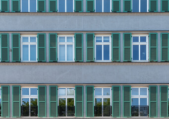 Obraz premium windows with green facade 