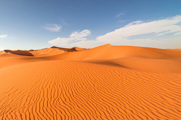 Fototapeta na wymiar Desert landscape Experience the captivating and serene landscape of vast sand dunes and wide desert vistas