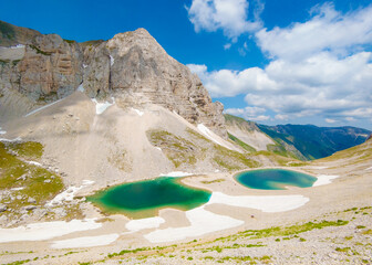 Monte Redentore and Pilato lake (Italy) - The landscape summit of Mount Redentore with Pilato lake,...