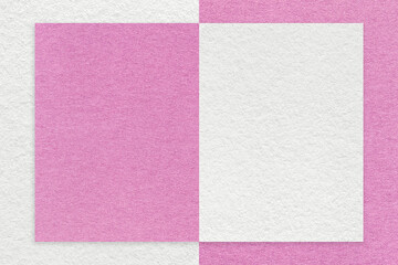 Fototapeta premium Texture of white and lilac paper background with geometric shape and pattern, macro. Craft magenta cardboard