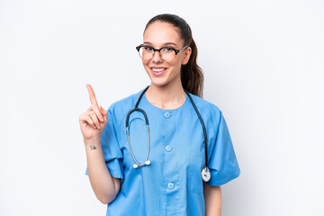 Young caucasian surgeon doctor woman isolated on white background pointing with the index finger a great idea