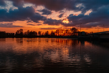 Sunset with reflections near Plattling, Isar, Bavaria, Germany