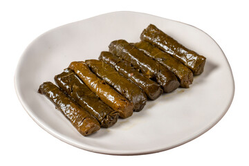 Delicious stuffing (yaprak sarma). Traditional food Turkish delicacies. Stuffed grape leaves rice in plate isolated on white background. Close up