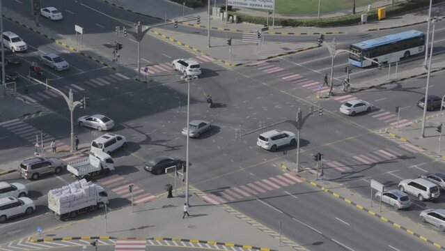 Sharjah, UAE,  December 3, 2022 Al Ittihad Park Pedestrian Road crossing in Sharjah during the Early Morning SLOG UNGRADED VIDEO