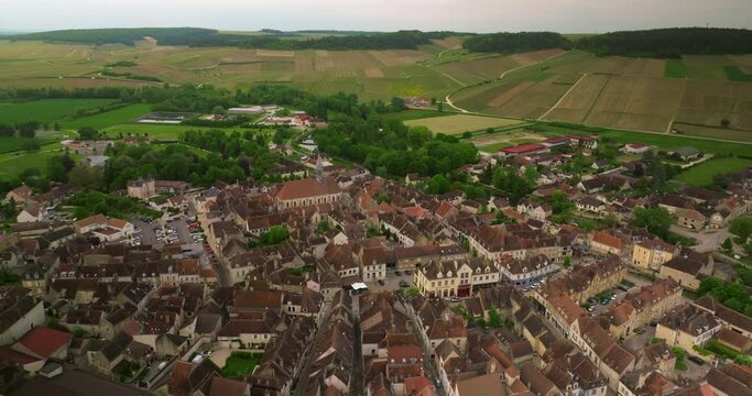 Aerial view of Chablis. Establishing shot city of Chablis, France. Chablis is a town and commune in the Yonne department of the Burgundy region. Situated in the valley of the Seran River