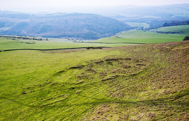 Cockburn Law Settlement on the east flank of Cockburn Law, Borders region, Scotland. Ancient multi period site with enclosure and hut circles. Aerial