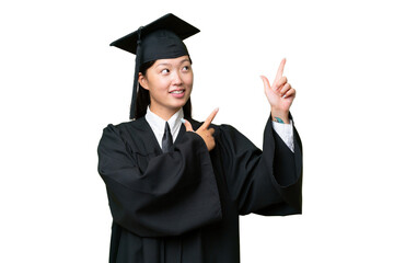 Young university graduate Asian woman over isolated background pointing with the index finger a great idea