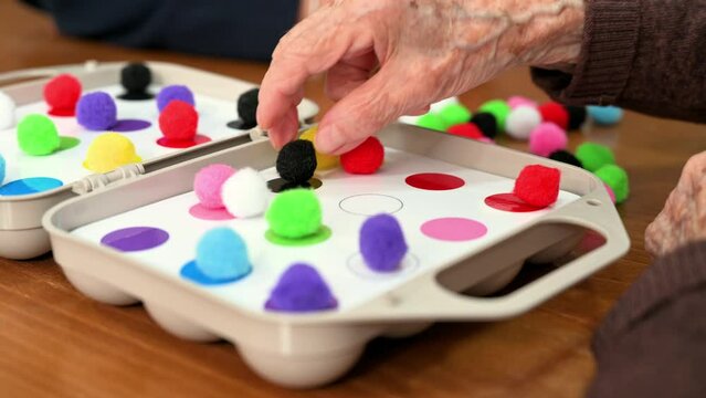 Rehabilitation center. Brain therapy cognitive psychological testing on senior patient. Alzheimer's disease and dementia prevention concept. Adaptation skills recovery. High quality 4k footage.