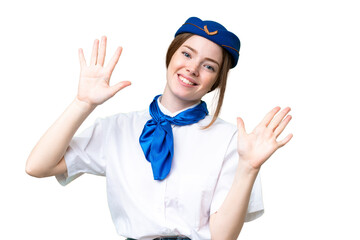 Airplane stewardess over isolated chroma key background counting ten with fingers