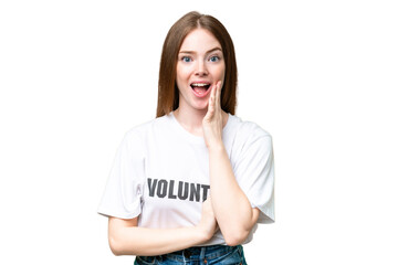 Young volunteer woman over isolated chroma key background with surprise and shocked facial expression