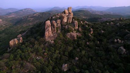 The rocks around Hyderabad are grey granite and the hardest rock formations in the world.