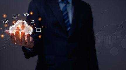 Businessmen use computers to visualize large online data in the cloud. It is a cloud server backup platform technology to ensure the safety of business data communications and data download systems.