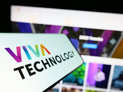 Stuttgart, Germany - 06-17-2023: Smartphone with logo of French conference Viva Technology (VivaTech) on screen in front of business website. Focus on left of phone display.