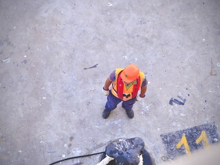 person painting the wall