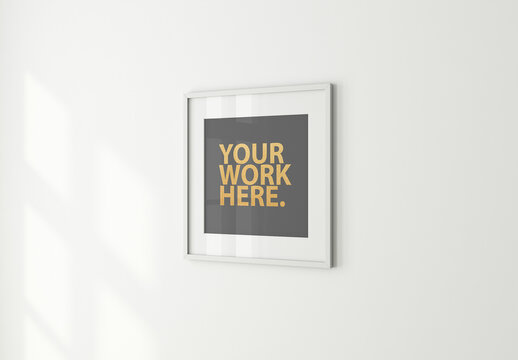 Square Art Frame Mockup with passepartout hanging on white wall