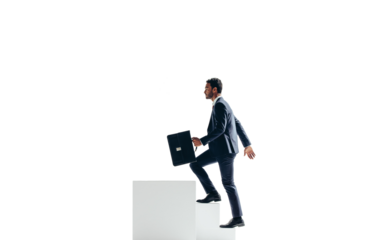 Businessman making his way to the top of the corporate ladder on a transparent background