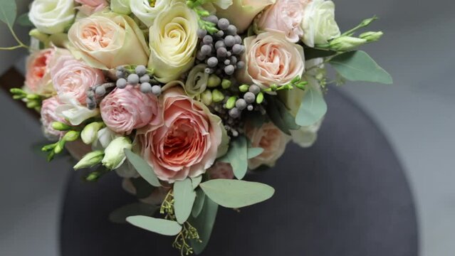 Close up panoramic shot of beautiful modern wedding bouquet for bride.