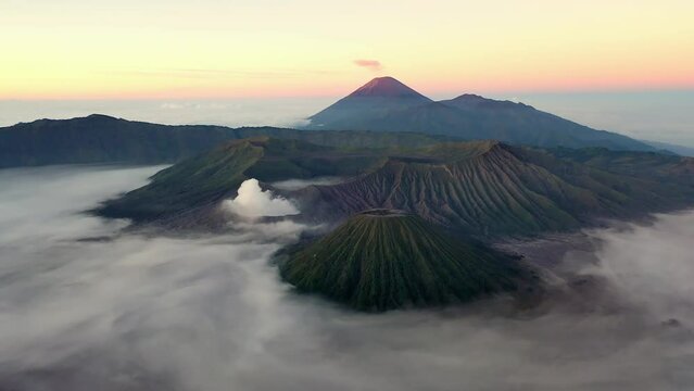 Sunrise over Bromo Volcano, Indonesia, slow cinematic drone travelling