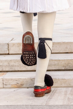 Evzones (tsoliades) traditional boots. Changing of Ceremonial Elite guard near Greek parlament at Syntagma square. Close up, selected focus. Athens, Greece