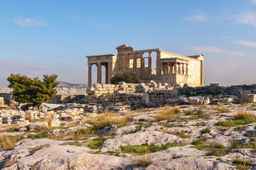 The ruines at Acropilis hill in a summer day, Erechtheum temple as background. Beautiful wallpaper....