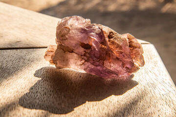 Pink amethyst, in its natural, non-polished state, reveals soft pink hues with translucent clarity....