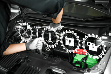 Car care maintenance and servicing, Hand technician auto mechanic using the wrench to fix car or...