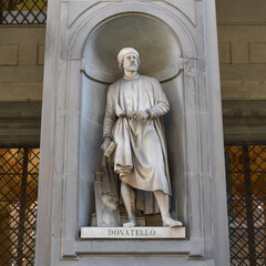 Florence, Italy - 20 Nov, 2022: Donatello, statue in the Niches of the Uffizi Colonnade in Florence