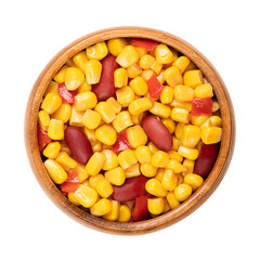 Mix of canned corn, red kidney beans and diced bell pepper, in a wooden bowl. Ready to eat Texas maize mix, as a side dish to a barbecue. Isolated, from above, close-up, over white, macro food photo.