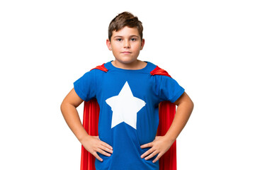 Little caucasian kid over isolated chroma key background in superhero costume posing with arms at hip and smiling © luismolinero