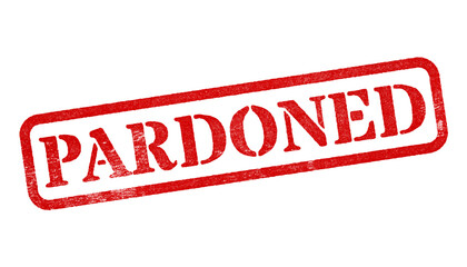 Pardoned red rubber stamp isolated on transparent background with distressed texture effect