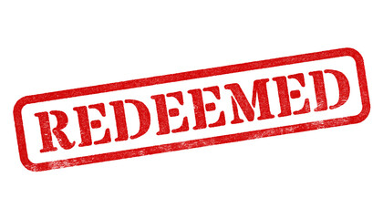 Redeemed red rubber stamp isolated on transparent background with distressed texture effect