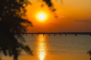 Panoramic view of the city of Dnipro during sunset or sunrise. Amazing sunset at Dnipro river with...