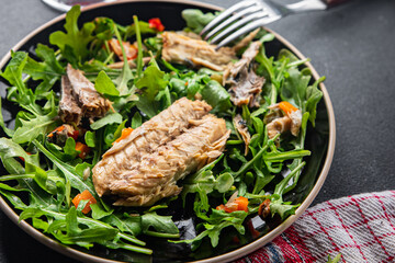 sardine salad green leaves salad mix healthy meal food snack on the table copy space food background rustic top view keto or paleo diet vegetarian pescatarian diet