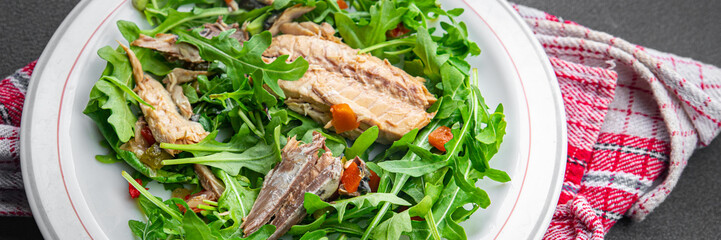 sardine salad green leaves salad mix healthy meal food snack on the table copy space food background rustic top view keto or paleo diet vegetarian pescatarian diet