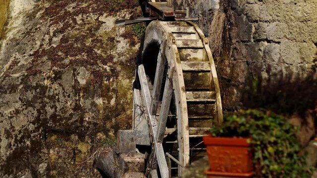 Mill wheel stops in the middle of the rocks