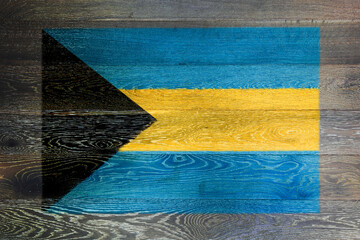 Bahamas flag on rustic old wood surface background