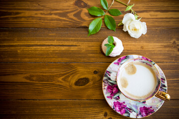 hot natural coffee with milk in a cup