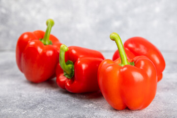 Fresh colorful red bell pepper on marble background. Bell pepper. Vegetables. Vegan food. Healthy foods. Place for text. Place to copy. Diet concept.