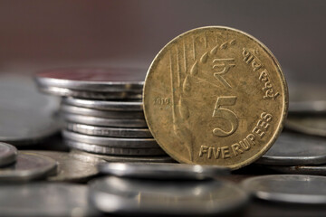 indian 5 rs coin closeup with blur background