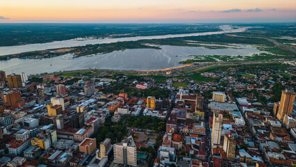 Fototapeta na wymiar Aerial Drone Fly Above Asuncion City Waterfront in Paraguay, Daylight Cityscape Panorama of South American River