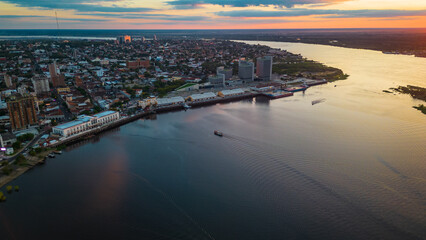 Aerial Drone Fly Above Asuncion City Waterfront in Paraguay, Daylight Cityscape Panorama of South American River