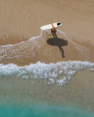 Aerial view of surfer at the beach - 616203100