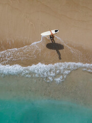 Aerial view of surfer at the beach - 616203550