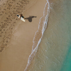 Aerial view of surfer at the beach