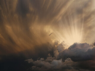 Fototapeta na wymiar sky with thunderstorm and sunbeams