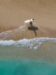 Aerial view of surfer at the beach - 616204198